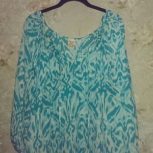 Blue and white patterned blouse